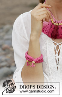 Summer Flair / DROPS 190-11 - Conjunto: pulseira crochetada e colar crochetado com borlas. O conjunto crocheta-se em DROPS Paris.