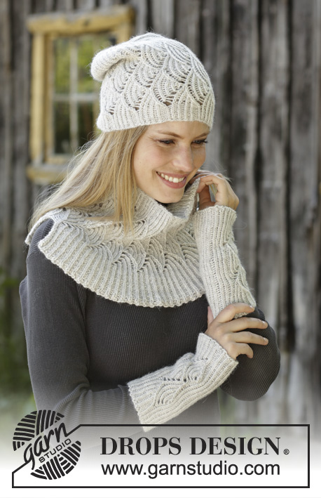 Winter Dunes / DROPS 192-21 - Knitted hat, neck warmer and wrist warmers in DROPS Puna. Set is knitted in rib with fan pattern.