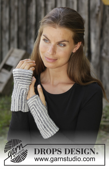 Beatrix / DROPS 192-47 - Knitted wrist warmer in DROPS Fabel. Piece is knitted back and forth in an angle with stripes.