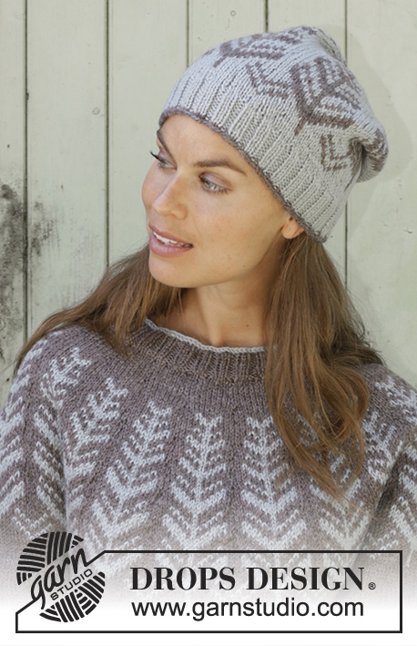 Inner Circle / DROPS 196-23 - Knitted sweater with round yoke in DROPS Karisma or DROPS Merino Extra Fine. Piece is knitted top down with Nordic pattern. Size: S - XXXL
Knitted hat in DROPS Karisma or DROPS Merino Extra Fine. Piece is knitted in the round with Nordic pattern.