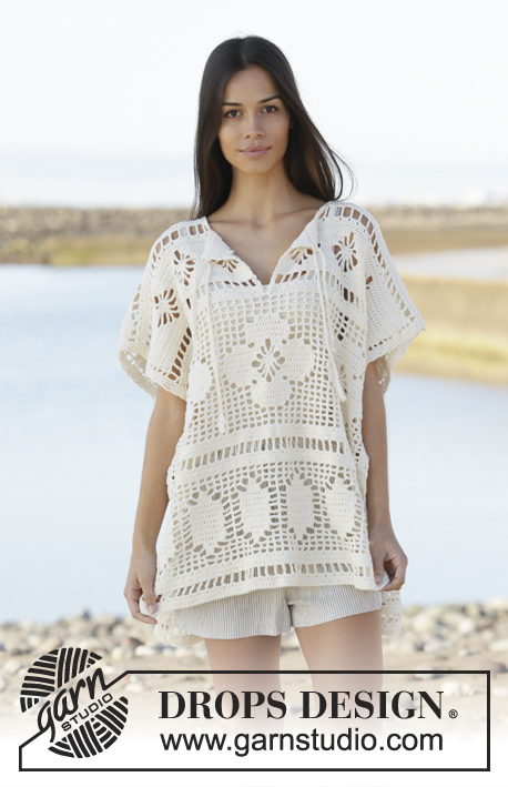 Carefree Summer / DROPS 199-16 - Crocheted poncho with lace pattern in DROPS Cotton Light. The piece is worked top down. Sizes S - XXXL.
