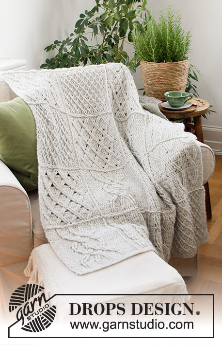 Celtic Comfort / DROPS 203-1 - Crocheted blanket in DROPS Air. The piece is worked in squares with cables and relief stitches.