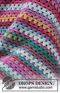 True Colours / DROPS 203-6 - Crocheted blanket in DROPS Delight. Crocheted in stripes with treble crochet groups.