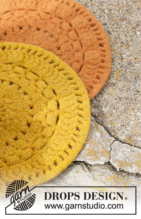 Autumn Sun / DROPS 203-7 - Crocheted and felted sitting mat in DROPS Snow. The piece is worked from the center outwards.
