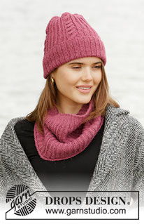 December Dawn / DROPS 204-42 - Knitted hat and neck warmer in DROPS Puna. Piece is knitted with rib, English rib and cables.