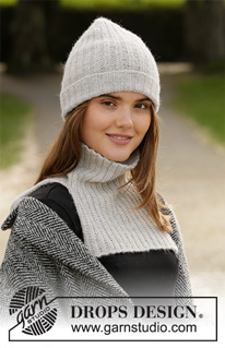 Purity / DROPS 204-47 - Knitted hat and neck warmer in DROPS BabyMerino. Piece is knitted with texture.