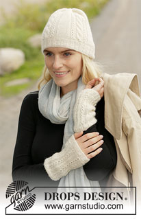 Celtic Companion / DROPS 204-50 - Knitted hat and wrist warmers with cables in DROPS Flora.