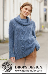 Blue Melody / DROPS 205-13 - Knitted long sweater in DROPS Melody. Piece is knitted top down with raglan cables and bobbles. Size: S - XXXL