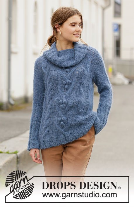 Blue Melody / DROPS 205-13 - Knitted long sweater in DROPS Melody. Piece is knitted top down with raglan cables and bobbles. Size: S - XXXL