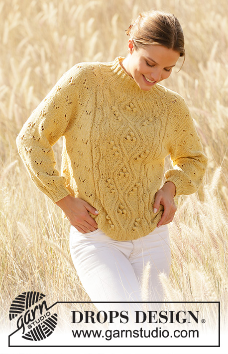 Golden Moments / DROPS 213-16 - Knitted sweater with raglan in DROPS Belle. Piece is knitted top down with lace pattern, cables and bobbles. Size XS–XXL.