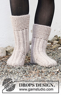 Rockslide Rockers / DROPS 214-61 - Knitted slippers with garter stitch and in English rib in DROPS Snow. Size 35-42 =
5-11.