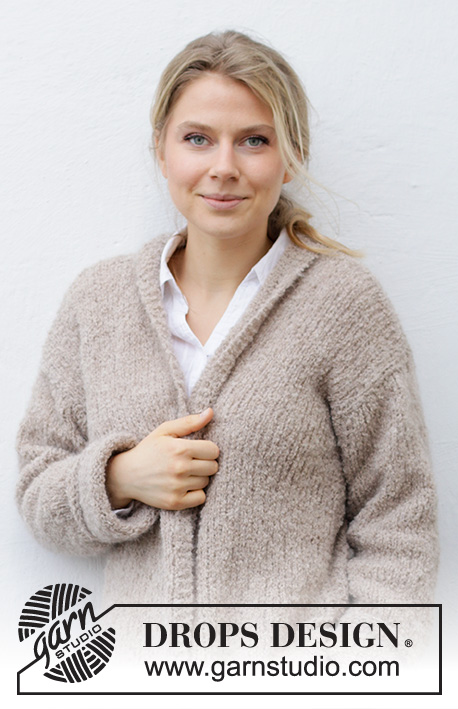 Good Book Cardigan / DROPS 215-36 - Knitted jacket in DROPS Alpaca Bouclé and DROPS Kid-Silk. The piece is worked in
stockinette stitch with a small shawl-collar and turn-ups on the sleeves. Sizes XS -
XXL.