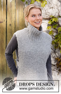 Avalon Tunic / DROPS 217-35 - Knitted vest / slipover in DROPS Alpaca Bouclé. The piece is worked with high neck and openings in the sides. Sizes S - XXXL.