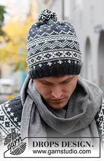 Winter's Night Enchantment Hat / DROPS 219-14 - Knitted hat for men in DROPS Karisma. The piece is worked in the round with Nordic pattern.