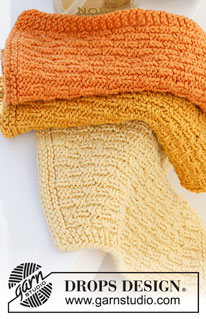 Happy Sunrise / DROPS 221-49 - Knitted cloths with textured pattern in DROPS Safran.