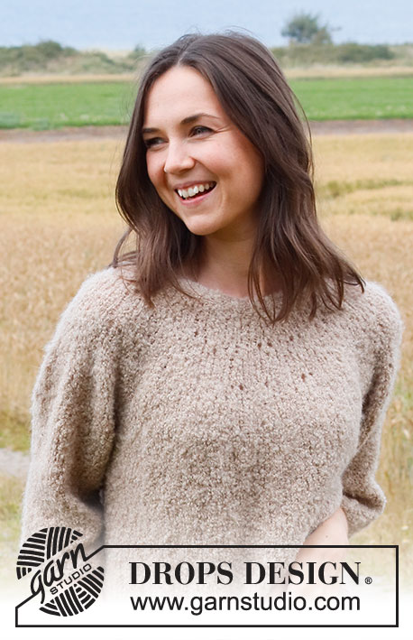 Crushed Walnuts Sweater / DROPS 222-15 - Knitted sweater in DROPS Alpaca Bouclé. The piece is worked top down with round yoke and ¾-length sleeves. Sizes S - XXXL.