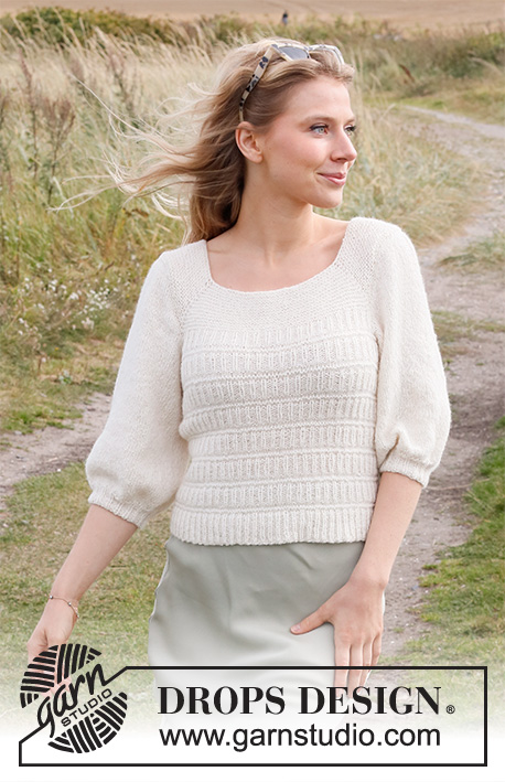 Summer Concerto / DROPS 222-39 - Knitted jumper in DROPS Sky. The piece is worked top down with raglan, textured pattern and ¾-length, puffed sleeves. Sizes S - XXXL.