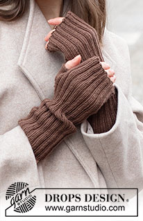 Hot Chocolate Wrist Warmers / DROPS 225-11 - Knitted wrist-warmers in DROPS BabyMerino. The piece is worked in the round with rib.