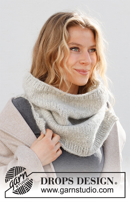Brisk Day / DROPS 225-31 - Knitted cowl in 2 strands DROPS Air or 1 strand DROPS Wish. Piece is knitted top down in stocking stitch with edges in rib and vents in each side.