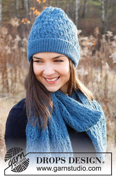 Blue Shells / DROPS 226-50 - Knitted hat and scarf in DROPS Alpaca or DROPS Nord. Piece is knitted with lace pattern.