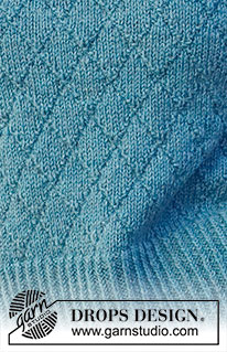 Deep Sea Diamond / DROPS 227-3 - Sweter na drutach przerabiany ściegiem strukturalnym, z pęknięciami na bokach i golfem, z włóczki DROPS Karisma. Od S do XXXL.