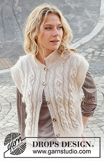 River Rapids / DROPS 227-7 - Knitted vest in DROPS Alpaca and DROPS Kid-Silk. The piece is worked with cables, bobbles and ribbed edges. Sizes S - XXXL.