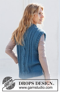 December Tide Vest / DROPS 228-40 - Knitted vest in DROPS Flora and DROPS Kid-Silk or DROPS Alpaca and DROPS Kid-Silk. The pieced is worked with cables, double neck and split in the slides. Sizes S - XXXL.
