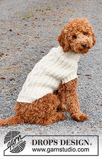 Snowy Trails / DROPS 228-52 - Sweter / płaszcz dla psa na drutach, z włóczki DROPS Karisma, z warkoczami. Od XS do M.