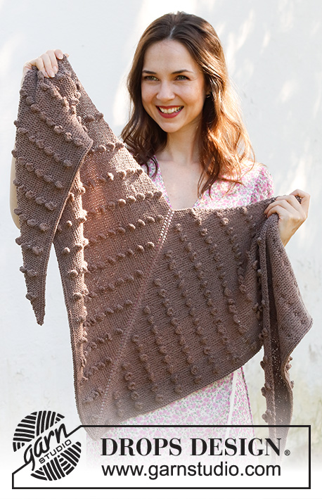Miss Austen / DROPS 229-13 - Knitted shawl in DROPS BabyMerino. The piece is worked top down with garter stitch and bobbles.