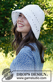 Breezy Belle Hat / DROPS 229-31 - Crocheted hat in DROPS Paris. Piece is crocheted top down with lace pattern.