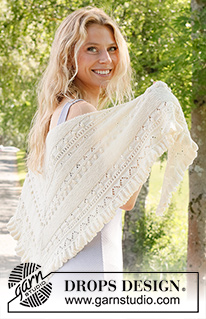 Ruffles Dream / DROPS 229-9 - Knitted shawl in DROPS BabyAlpaca Silk. The piece is worked top down with lace pattern, bobbles and flounces.