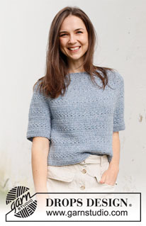 Spring Renaissance Top / DROPS 230-40 - Crocheted jumper with short sleeves / t-shirt in DROPS Sky. Piece is crocheted top down with round yoke and lace pattern. Size: S - XXXL