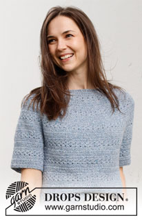 Spring Renaissance Top / DROPS 230-40 - Crocheted sweater with short sleeves / t-shirt in DROPS Sky. Piece is crocheted top down with round yoke and lace pattern. Size: S - XXXL