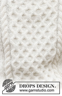 Cream Wafer / DROPS 233-5 - Pánský raglánový pulovr pletený copánkovým a perličkovým vzorem shora dolů z příze DROPS Air. Velikost S - XXXL.