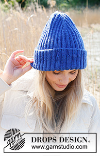 She's Electric / DROPS 234-12 - Knitted hat / hipster hat in DROPS Karisma. Piece is knitted top down in rib with folding edge.