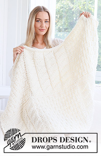 Winter Harbour / DROPS 234-6 - Knitted blanket in DROPS Polaris. The piece is worked in squares with relief-pattern.