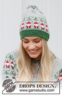Christmas Time Hat / DROPS 234-62 - Knitted hat in DROPS Karisma. The piece is worked bottom up, with coloured pattern of Santa and Christmas tree. Theme: Christmas.