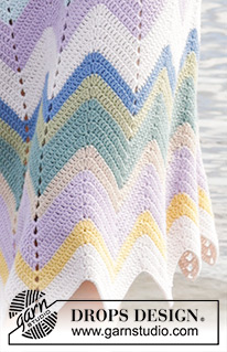 Reflections of Aurora / DROPS 239-27 - Crocheted skirt in DROPS Safran. The piece is worked top down with zig-zag pattern and stripes. Sizes S - XXXL.