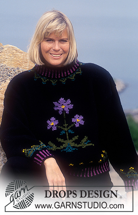 Violets at Midnight / DROPS 24-8 - DROPS sweater with flower pattern mid front in “Alaska”.