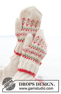 Something About Holly Mittens / DROPS 242-19 - Knitted mittens in DROPS Air. The piece is worked with multi-colored pattern.