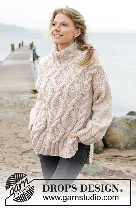 Cable Beach Sweater / DROPS 243-23 - Knitted over-sized jumper in DROPS Snow. The piece is worked top down with cables, split in sides and double neck. Sizes S - XXXL.