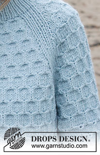 Mermaid Bay / DROPS 245-1 - Sweter na drutach przerabiany od góry do dołu z włóczki DROPS Nepal. Z podwójnym wykończeniem dekoltu, reglanowymi rękawami, ściegiem plaster miodu i pęknięciami na bokach. Od S do XXXL.