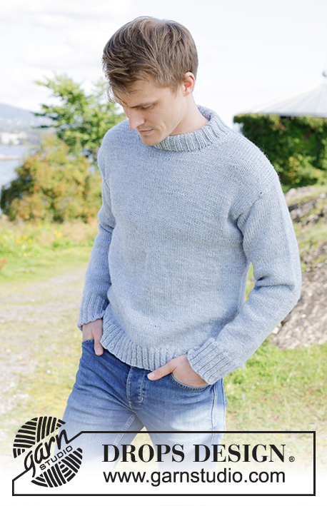 Waterway / DROPS 246-14 - Knitted sweater for men in DROPS Alaska. The piece is worked top down in stockinette stitch with European/diagonal shoulders. Sizes S - XXXL.