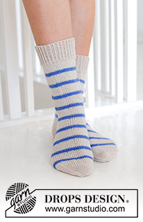 Marina Del Rey Socks / DROPS 247-13 - Knitted socks in DROPS Fabel. Piece is knitted top down in stockinette stitch with stripes. Size 35 to 43 = US 4 1/2 to 12 1/2