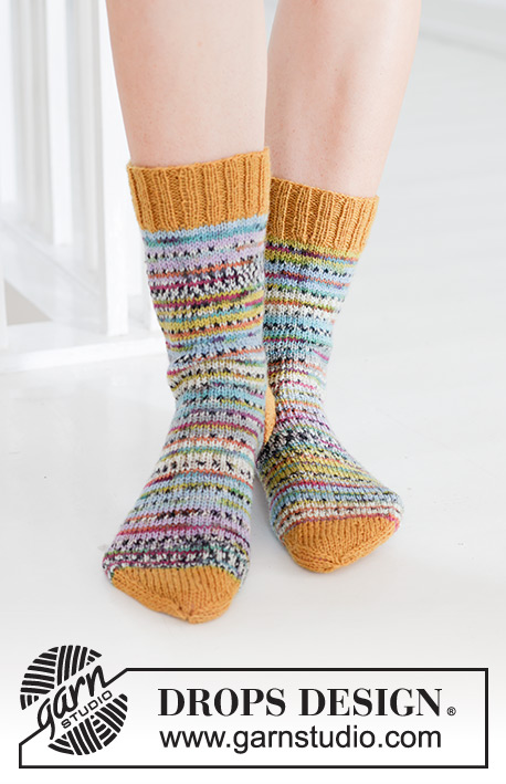 Spring Carnival Socks / DROPS 247-16 - Knitted socks in DROPS Fabel. Piece is knitted top down in stockinette stitch. Size 35 to 43 = US 4 1/2 to 12 1/2