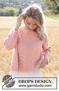 Pink Paradise / DROPS 248-14 - Raglánový pulovr s copánkovým a ažurovým vzorem pletený shora dolů z příze DROPS Flora nebo DROPS Baby Merino. Velikost S - XXXL.