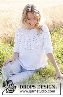 Peace Dove / DROPS 249-21 - Knitted sweater with ¾ sleeves in DROPS Belle or DROPS Cotton Light. Piece is knitted top down with round yoke and wave pattern on yoke. Size: S - XXXL