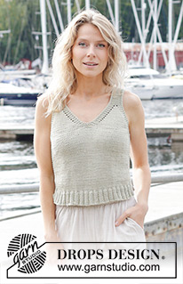 Sage Coast / DROPS 249-25 - Knitted top in DROPS Paris. The piece is worked top down with stockinette stitch, V-neck, I-cord and split in sides. Sizes S - XXXL.
