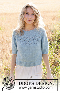 Blueberry Leaf / DROPS 249-9 - Knitted sweater in DROPS Sky or DROPS Merino Extra Fine. Piece is knitted top down with round yoke, lace pattern and short sleeves. Size: S - XXXL