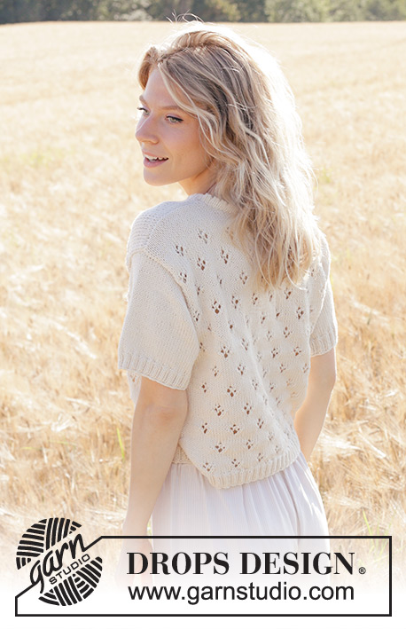 White Spring / DROPS 250-7 - Knitted top in DROPS Cotton Merino. Piece is knitted bottom up with lace pattern and short sleeves. Size XS – XXL.